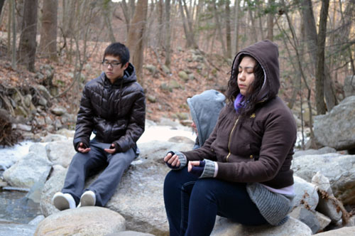 Ilchi-Lee_IBREA_WYL Participants practice Brain Education meditation outside at Honor's Haven.