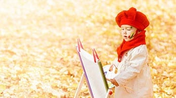 girl in red beret painting